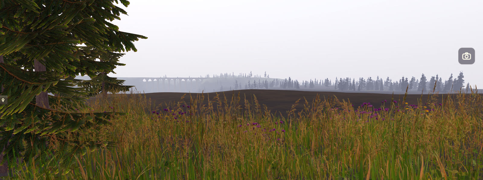 A meadow in Sedgewold, the viaduct in the fog, the booth waiting in the corner